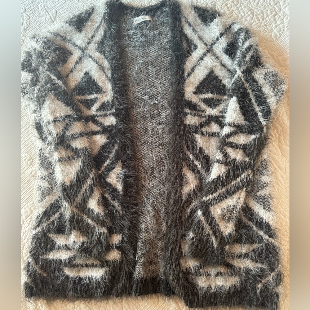 Black, white and grey fuzzy sweater